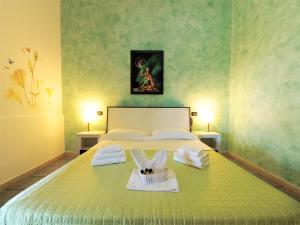Postel nebo postele na pokoji v ubytování Hotel Alba Chiara Sant'Andrea Salento