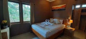 The point surfcamp Bali客房内的一张或多张床位