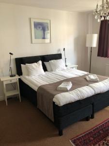 Letto o letti in una camera di Värdshuset Hwitan