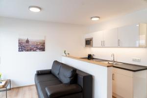Kuchyň nebo kuchyňský kout v ubytování AMBERG APART - Apartment B - Wohnraum auf Zeit + 27 fotografií