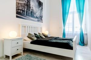 Postel nebo postele na pokoji v ubytování Luxury Paulay street Apartment