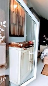 A bed or beds in a room at Oriñon Beach Apartment