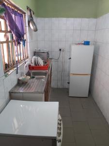 Dapur atau dapur kecil di StayCation Suites And Apartment