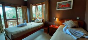 The point surfcamp Bali客房内的一张或多张床位