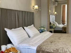 Een bed of bedden in een kamer bij Apart Reserve Central
