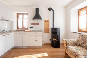 A cozinha ou cozinha compacta de La Gerla Casa Vacanze Dolomiti