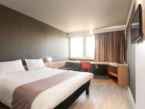 Postel nebo postele na pokoji v ubytování Ibis Alès Centre Ville