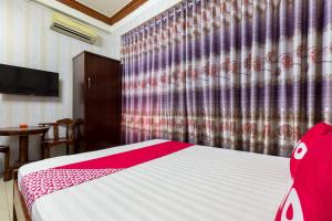Krevet ili kreveti u jedinici u okviru objekta OYO 476 Van Anh Hotel