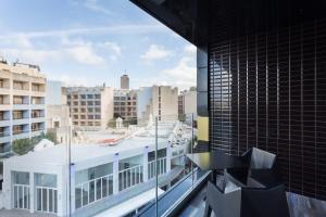 Ein Sitzbereich in der Unterkunft H Hotel & SPA - Adults Only