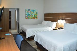 Postel nebo postele na pokoji v ubytování Holiday Inn Express Seguin by IHG