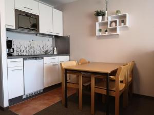 Kuchyň nebo kuchyňský kout v ubytování Apartment Michaela