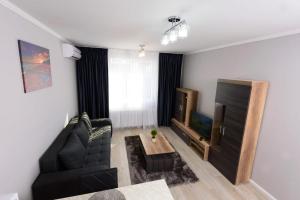 Posezení v ubytování Povi Residence + 4 fotografie