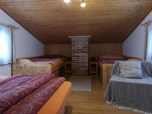 A bed or beds in a room at Penzion 108 - Herlíkovice