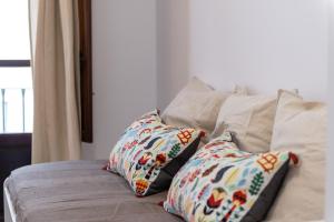 Postel nebo postele na pokoji v ubytování Apartamento Realejo Casco Historico