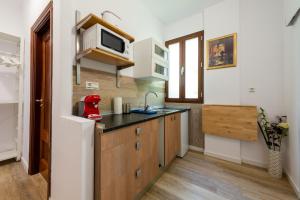 Kuchyň nebo kuchyňský kout v ubytování Apartamento Realejo Casco Historico