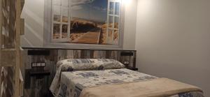 Posteľ alebo postele v izbe v ubytovaní Apartamento Sol deluxe Suances