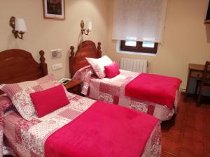 Postel nebo postele na pokoji v ubytování Hostal Mizmaya