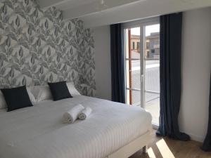 Postel nebo postele na pokoji v ubytování Cream homes Santa Catalina ETV