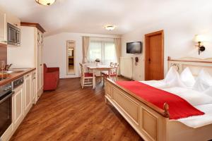 Posteľ alebo postele v izbe v ubytovaní Aparthotel Dachsteinblick