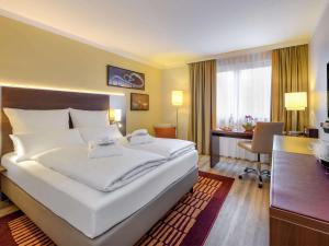 Postel nebo postele na pokoji v ubytování Mercure Hotel Duisburg City + 37 fotografií