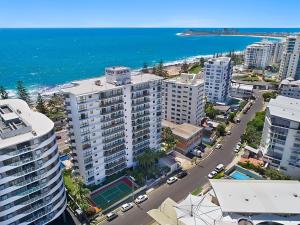 an aerial view of a city with the ocean at Seaview Resort in Mooloolaba