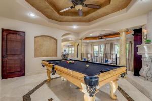 a pool table in a room with a ceiling at Estate Resort Style Oasis 6BDRM, 5.5 Bath Heated Pool with Misters in Scottsdale