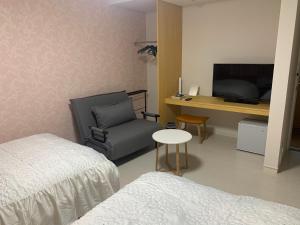 TV a/nebo společenská místnost v ubytování Guesthouse Zink
