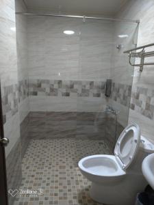 Koupelna v ubytování 知本赫克力士親子民宿Chihpen Hercules Family Homestay + 23 fotografií