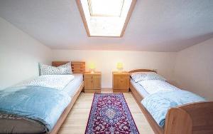A bed or beds in a room at Ferienwohnung Kienast