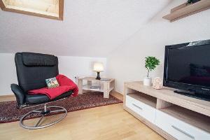A television and/or entertainment centre at Ferienwohnung Kienast