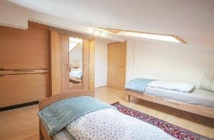 A bed or beds in a room at Ferienwohnung Kienast