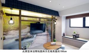 Postel nebo postele na pokoji v ubytování K Hotel - Yizhong