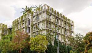 an old building with trees in front of it at Thanksgiving Serviced Residence in Singapore