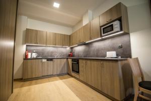 Kuchyňa alebo kuchynka v ubytovaní Apartmány pod Jeřábem, Šanov 67, Červená Voda