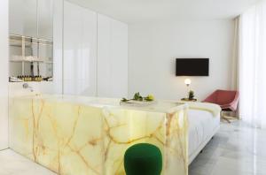 TV a/nebo společenská místnost v ubytování Hotel Aromar