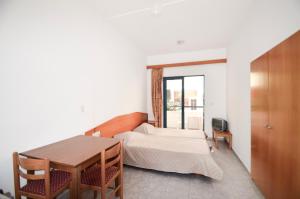Cama ou camas em um quarto em Stegna Star Apartments