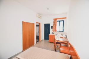 Cama ou camas em um quarto em Stegna Star Apartments