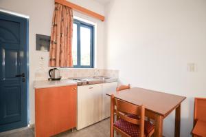 A cozinha ou cozinha compacta de Stegna Star Apartments