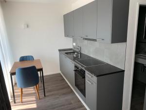 Küche/Küchenzeile in der Unterkunft SWAS by Livingdowntown