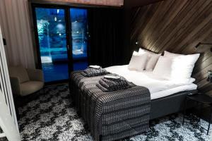 Postel nebo postele na pokoji v ubytování Design Hotel Levi