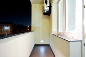 Telewizja i/lub zestaw kina domowego w obiekcie Apartment Giuliano Vienna