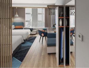 Holiday Inn Express Urumqi Station by IHG客房内的一张或多张床位