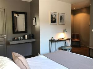 Postel nebo postele na pokoji v ubytování Villa Limone, maison d'hôtes + 37 fotografií