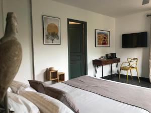 Säng eller sängar i ett rum på Villa Limone, maison d'hôtes
