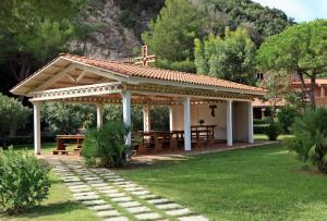 a gazebo with a cross on top of it at Elba in relax in Rio Marina