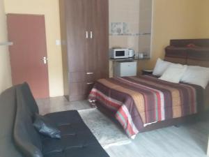 Η κουζίνα ή μικρή κουζίνα στο Trianca guest house