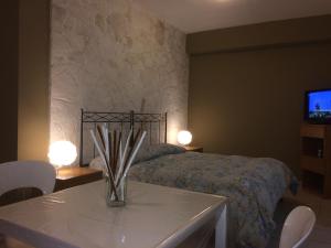 Katil atau katil-katil dalam bilik di Bed and Breakfast Top Class