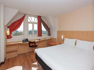 Postel nebo postele na pokoji v ubytování ibis Metz Centre Gare