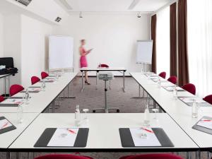 The business area and/or conference room at ibis München City Nord