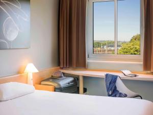 Katil atau katil-katil dalam bilik di ibis Augsburg Koenigsplatz